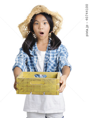 girl farmer holding yellow wooden basket isolate girl farmer holding yellow wooden basket isolate 40744100
