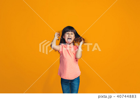 The squint eyed teen girl with weird expression 40744883