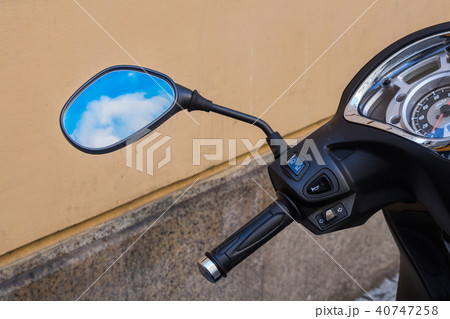 Sky in the mirror of a bike 40747258