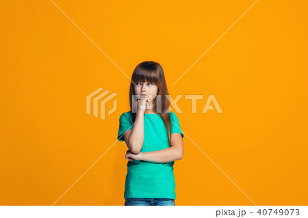 Young serious thoughtful teen girl. Doubt concept. 40749073