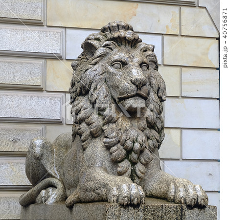 Ancient Sculpture sitting stone Lion leadership sy 40756871