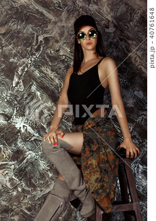 beautiful model in military jacket posing beautiful model in military jacket posing 40761648