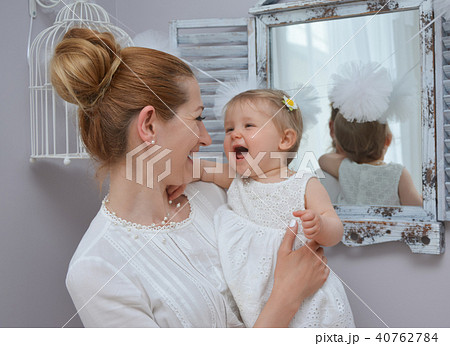 Happy mother's day Mum and girl smiling 40762784