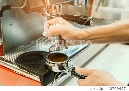 Barista prepare a coffee for extract . 40769497