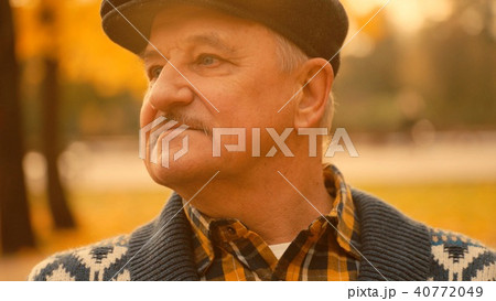 Old man portrait in the autumn park Old man portrait in the autumn park 40772049