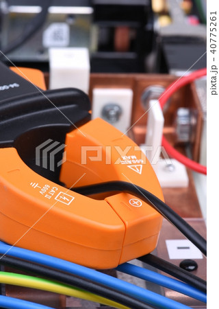 Clamp meter measure current on cable Clamp meter measure current on cable 40775261