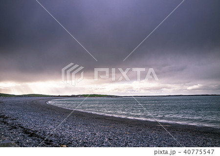 Dramatic sky above Cemlyn Bay, Anglesey in north Wales Dramatic sky above Cemlyn Bay, Anglesey in north Wales 40775547