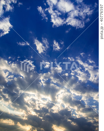 Fluffy clouds in the blue sky 40776597