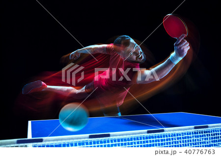 The table tennis player serving 40776763