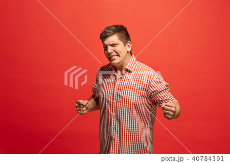 Winning success man happy ecstatic celebrating being a winner. Dynamic energetic image of male model Winning success man happy ecstatic celebrating being a winner. Dynamic energetic image of male model 40784391