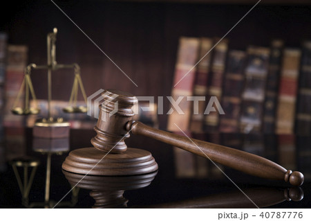Law theme, mallet of judge, wooden gavel Law theme, mallet of judge, wooden gavel 40787776