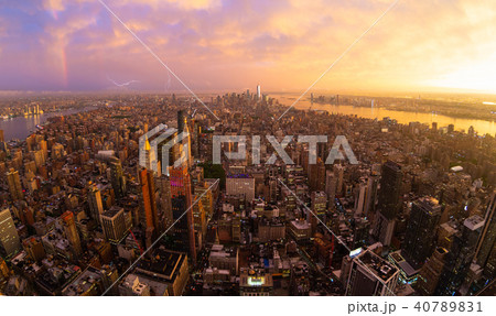 New York City skyline with Manhattan skyscrapers at dramatic stormy sunset, USA. New York City skyline with Manhattan skyscrapers at dramatic stormy sunset, USA. 40789831