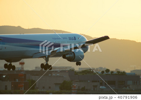 飛行機 夕陽 40791906