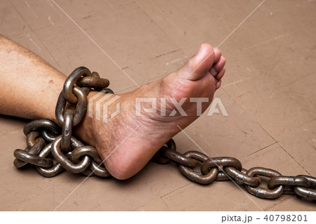 Male Prisoner Chain Bondage on the Floor. 40798201
