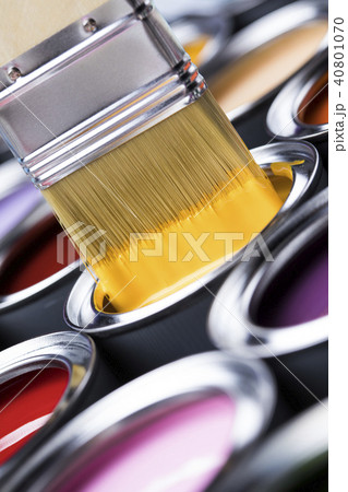 Paintbrush on cans with color Paintbrush on cans with color 40801070