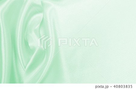 Smooth elegant green silk or satin luxury cloth Smooth elegant green silk or satin luxury cloth 40803835
