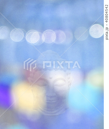 Buddha head and blue blurry light 40804542