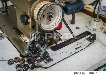 Close up of old sewing machine bobbins Close up of old sewing machine bobbins 40815966
