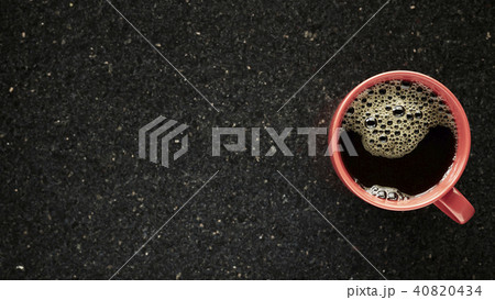Cup of coffee on granite table 40820434