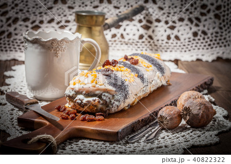Pieces of poppy seed cake on a plate. Pieces of poppy seed cake on a plate. 40822322