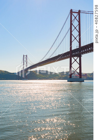 25th april bridge against blue sky - Lisbon 40827598
