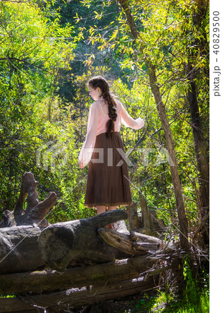 Beautiful girl dressed in the style of boho Beautiful girl dressed in the style of boho 40829500