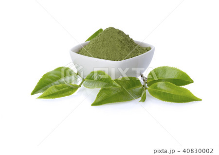 Powder green tea and green tea leaf on white backg Powder green tea and green tea leaf on white backg 40830002