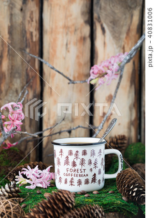 White ceramic cup of coffee on rustic background White ceramic cup of coffee on rustic background 40831006
