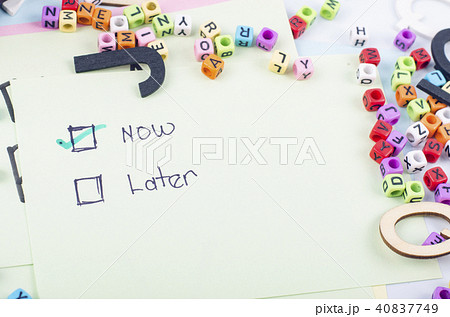 sticky paper with handwriting word LATER and NOW sticky paper with handwriting word LATER and NOW 40837749