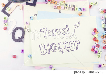 TRAVEL BLOGGER word written on yellow paper TRAVEL BLOGGER word written on yellow paper 40837750