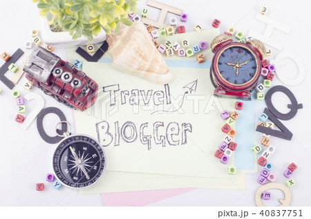 TRAVEL BLOGGER word written on yellow paper TRAVEL BLOGGER word written on yellow paper 40837751