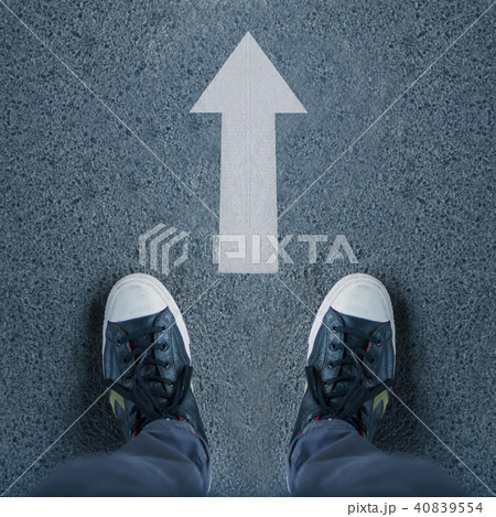Pair of shoes and white arrows, walking forward Pair of shoes and white arrows, walking forward 40839554