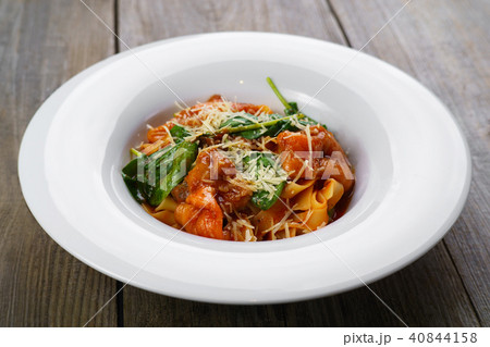 Italian pasta with smoked salmon and spinach 40844158