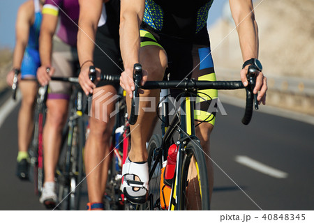 Cycling competition,cyclist athletes riding a race 40848345
