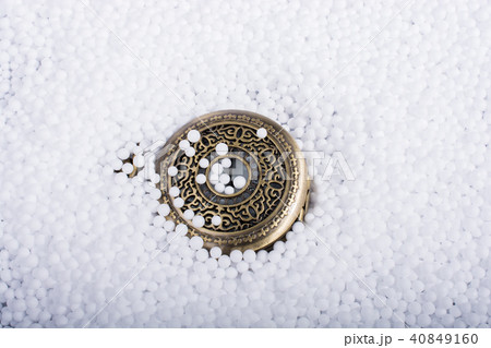 Pocket watch on white polystyrene foam balls Pocket watch on white polystyrene foam balls 40849160