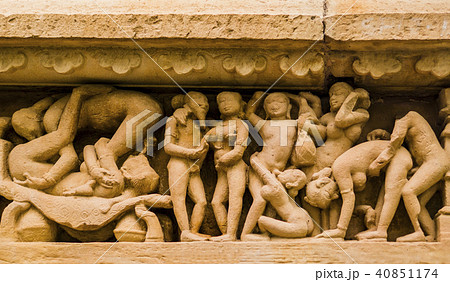 Erotic sculpture in Khajuraho temple, India 40851174