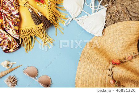 diverse travel girlish stuff on colorful background blue and yel 40851220