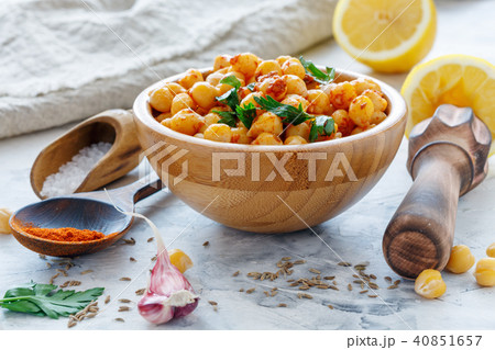 Spicy appetizer of boiled chickpeas in a bowl. 40851657