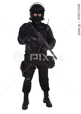 Riot police officer in black uniform Riot police officer in black uniform 40853488