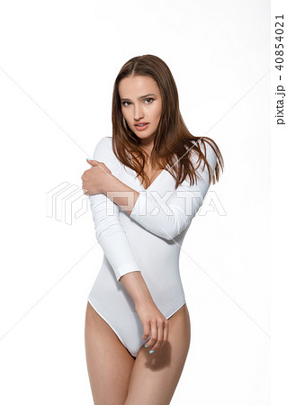 beautiful sexy woman with perfect body in white bodysuit 40854021
