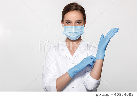 doctor wearing mask and gloves doctor wearing mask and gloves 40854085