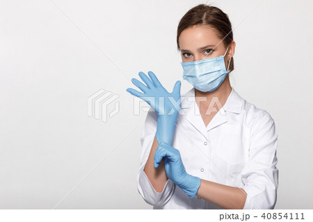 doctor wearing mask and gloves 40854111