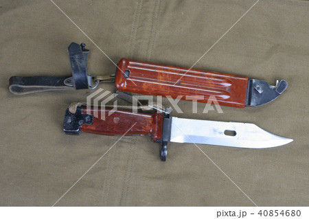 bayonet with saw Kalashnikov rifle on uniform bayonet with saw Kalashnikov rifle on uniform 40854680