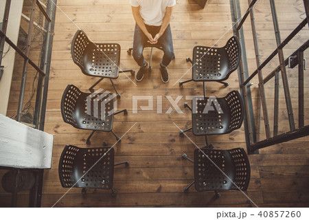 Man waiting his turn inside 40857260