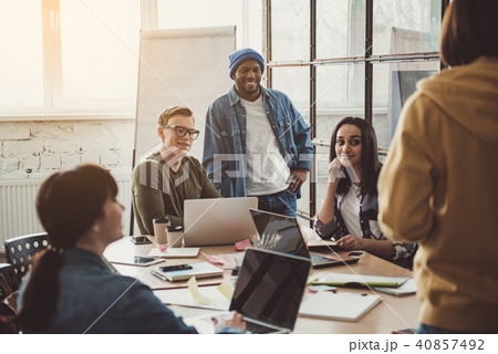 Positive partners talking during job 40857492