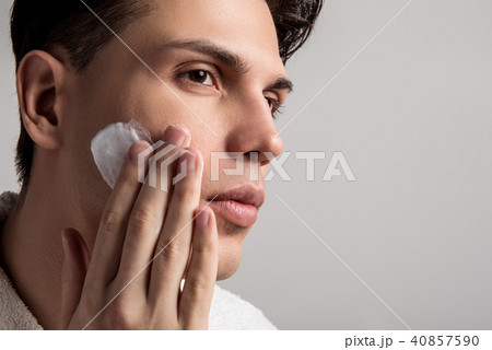Young man is caring about his appearance 40857590