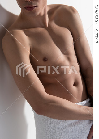 Young guy is demonstrating his naked corpus 40857671