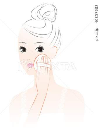 メイクをする女性。パウダーファンデーション。 40857682