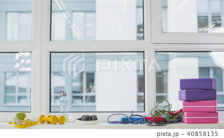 Sport equipment lying on windowsill 40858135