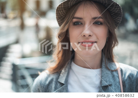 Young lady looking forward with joy outside Young lady looking forward with joy outside 40858632